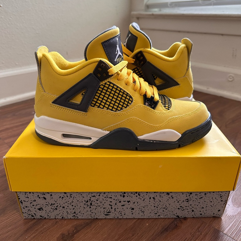 Air Jordan 4 Retro “Lightning” (2021) in size 7Y (Grade School)